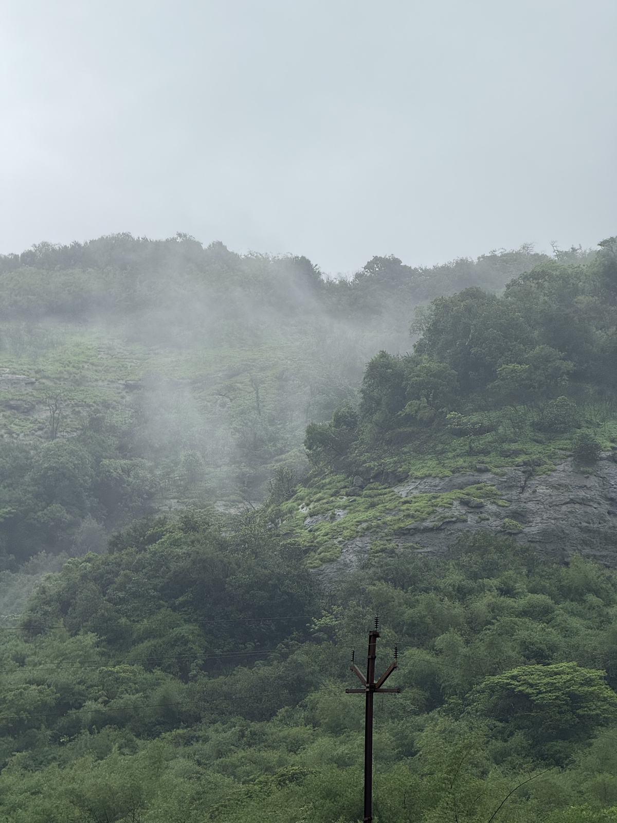 Hill covered by clouds